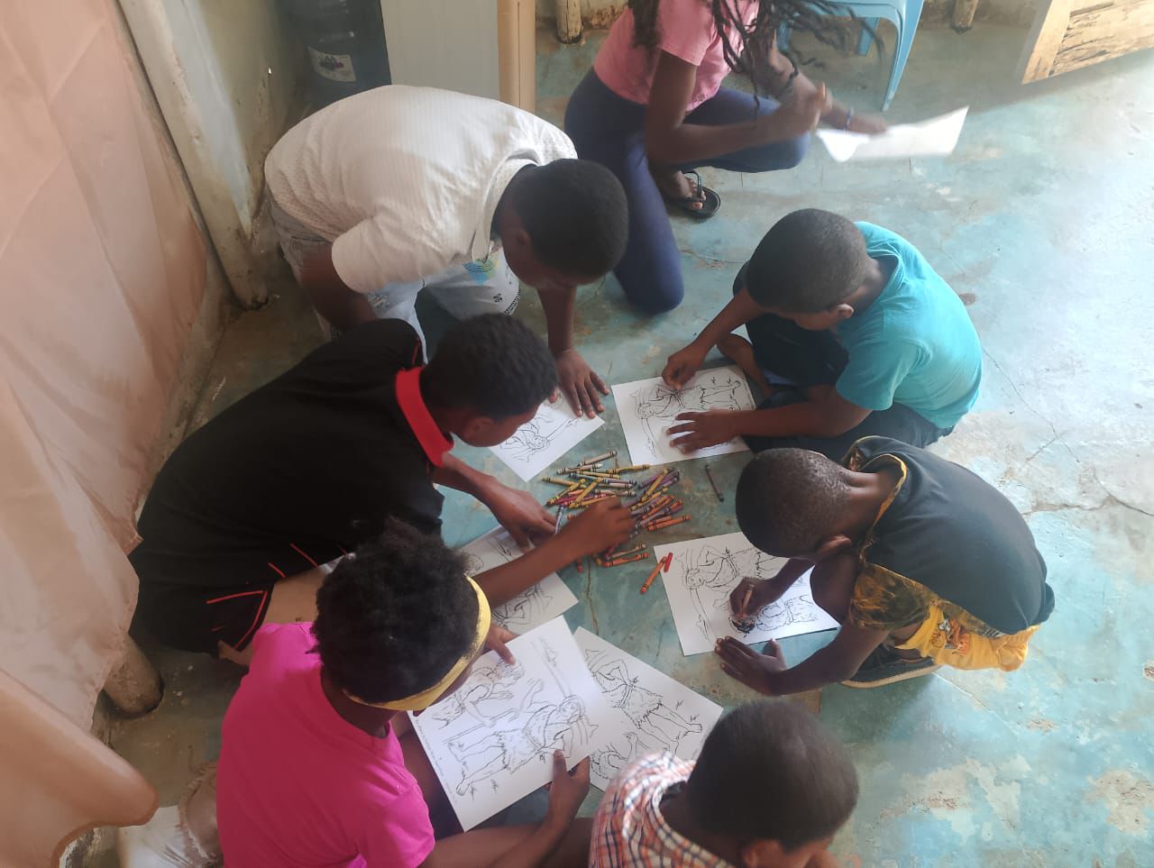 Children praying in a group